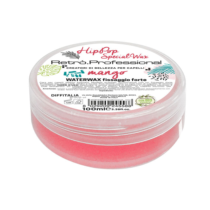 Vaso trasparente con tappo a vite. Etichetta bianca sulla parte superiore del tappo.
