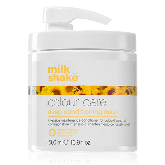 Vaso bianco con rifiniture giallo ocra con tappo a becco bianco e immagine di girasoli sul fronte.